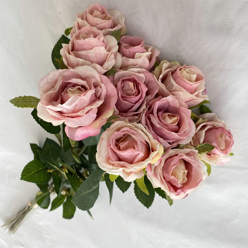 Decorative flowers artificial flowers are Garden Rose made of fabric cloth, available in 8 colors. Artificial rose flowers are used for home decoration and event decorations. Leafhometrade specializes in providing wholesale custom artificial flower arrangements.