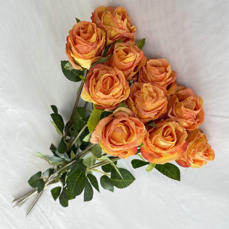 Decorative flowers artificial flowers are Garden Rose made of fabric cloth, available in 8 colors. Artificial rose flowers are used for home decoration and event decorations. Leafhometrade specializes in providing wholesale custom artificial flower arrangements.