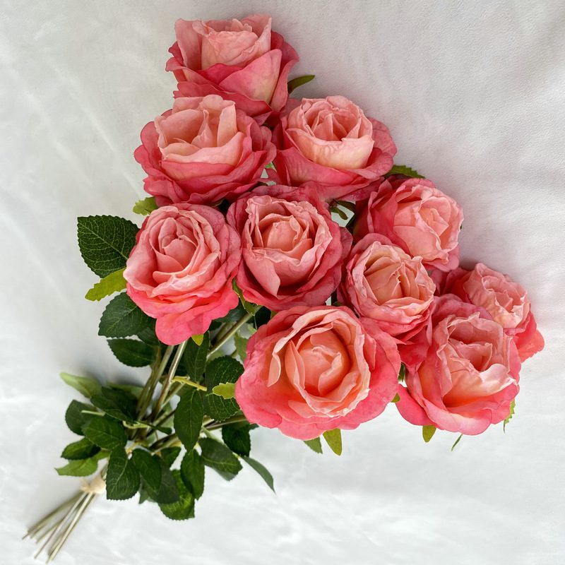 Decorative flowers artificial flowers are Garden Rose made of fabric cloth, available in 8 colors. Artificial rose flowers are used for home decoration and event decorations. Leafhometrade specializes in providing wholesale custom artificial flower arrangements.