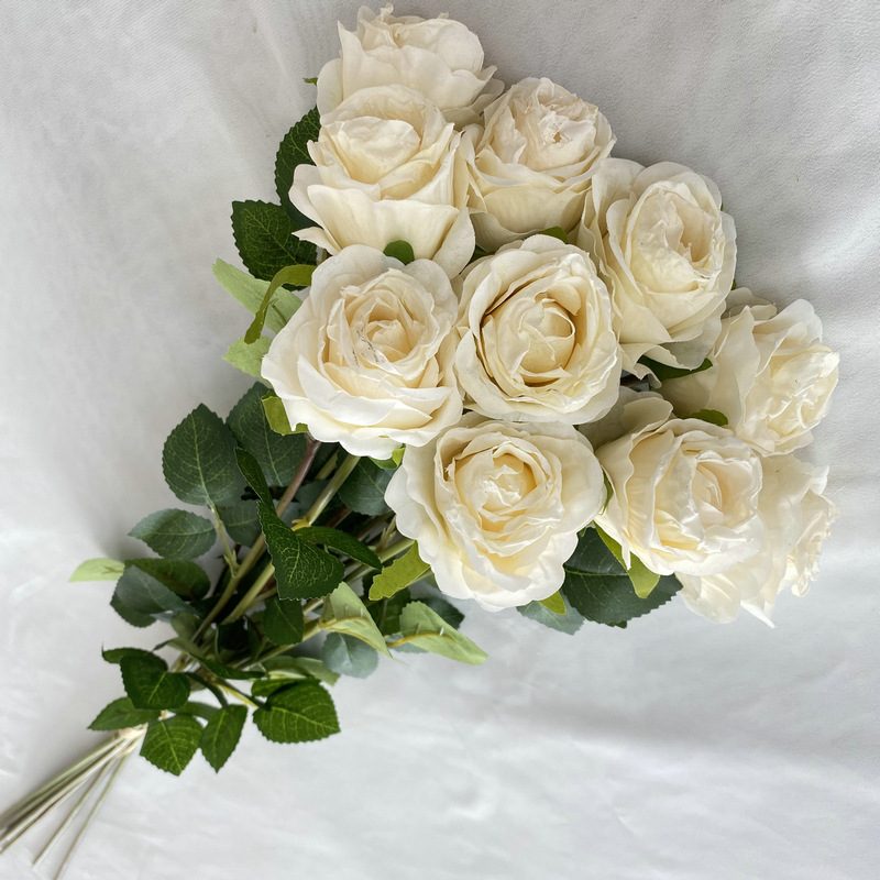 Decorative flowers artificial flowers are Garden Rose made of fabric cloth, available in 8 colors. Artificial rose flowers are used for home decoration and event decorations. Leafhometrade specializes in providing wholesale custom artificial flower arrangements.