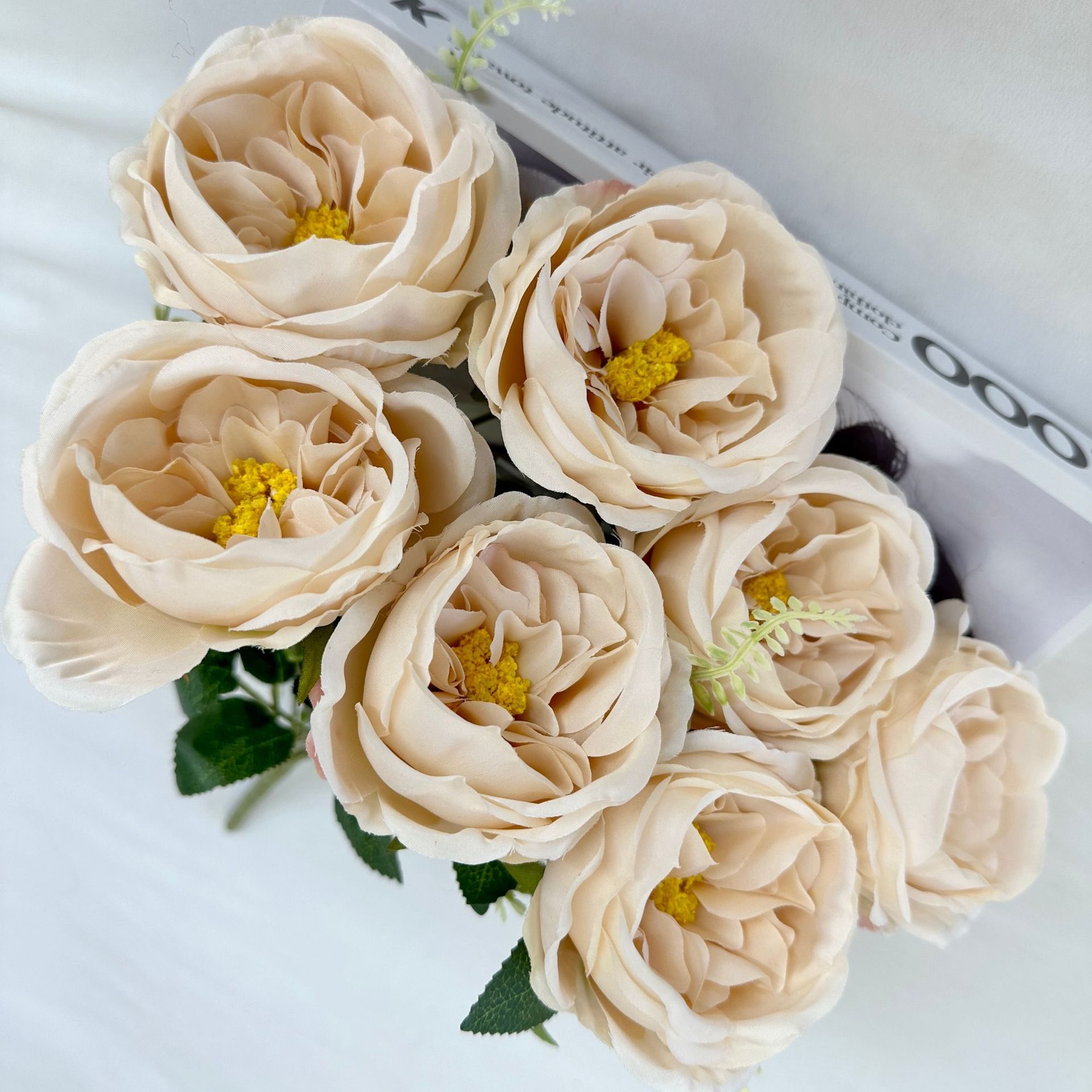 The artificial flowers are Garden Rose made from brushed fabric and are available in 9 colors. Artificial rose flowers are used for home decoration and wedding flower arrangements. Leafhometrade specializes in providing wholesale custom artificial plants.