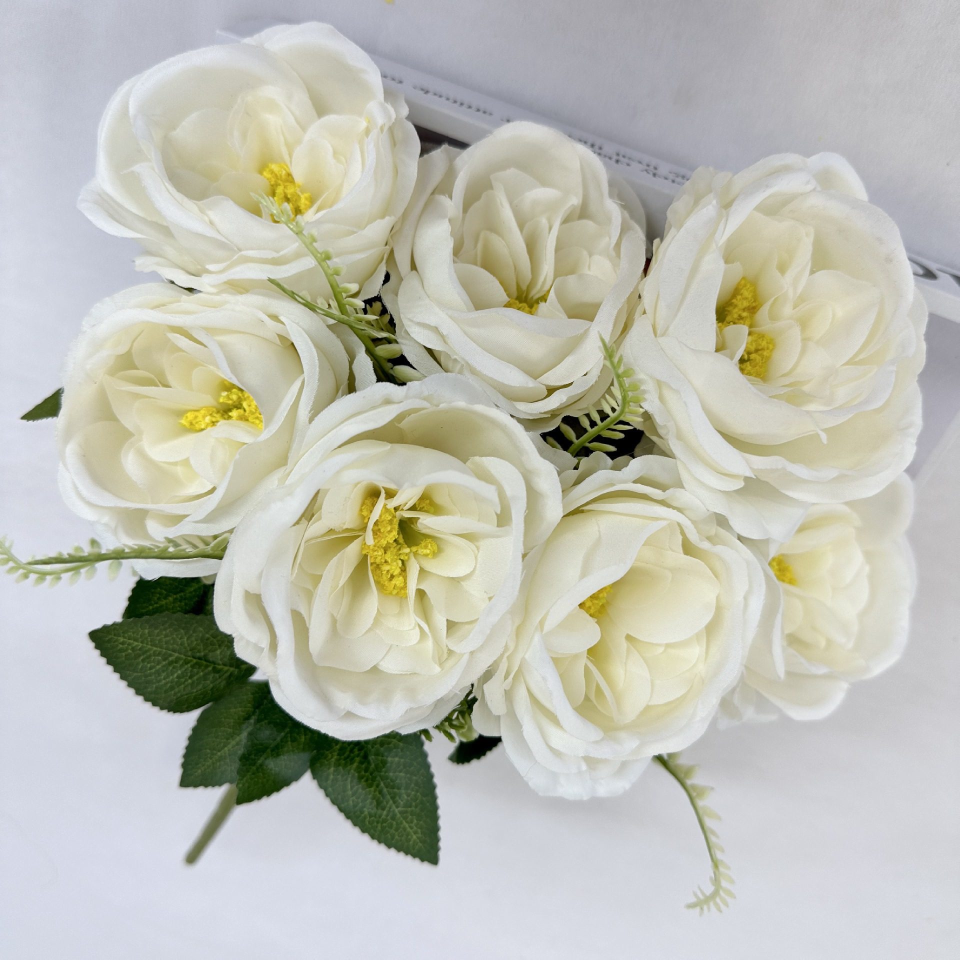 The artificial flowers are Garden Rose made from brushed fabric and are available in 9 colors. Artificial rose flowers are used for home decoration and wedding flower arrangements. Leafhometrade specializes in providing wholesale custom artificial plants.