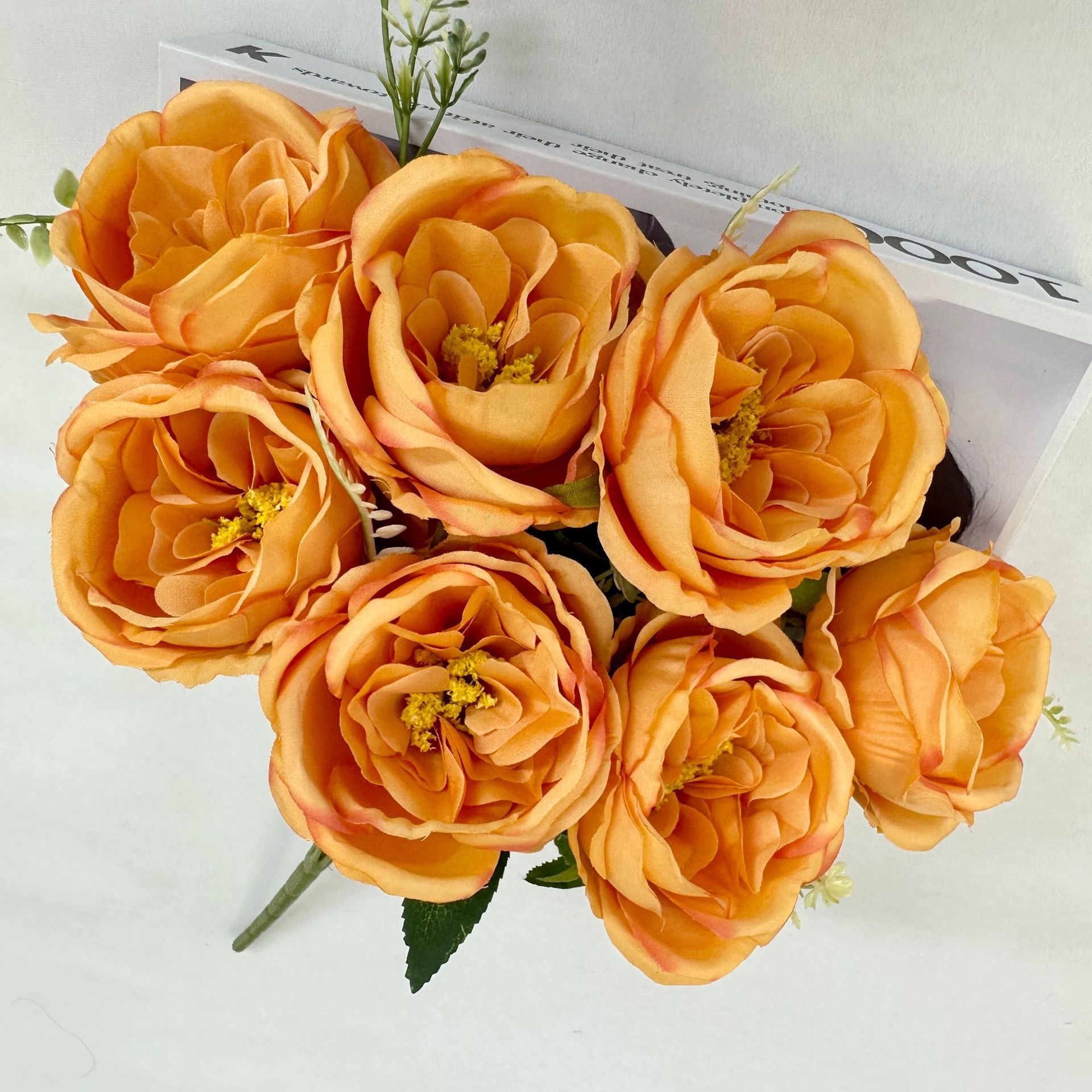 The artificial flowers are Garden Rose made from brushed fabric and are available in 9 colors. Artificial rose flowers are used for home decoration and wedding flower arrangements. Leafhometrade specializes in providing wholesale custom artificial plants.