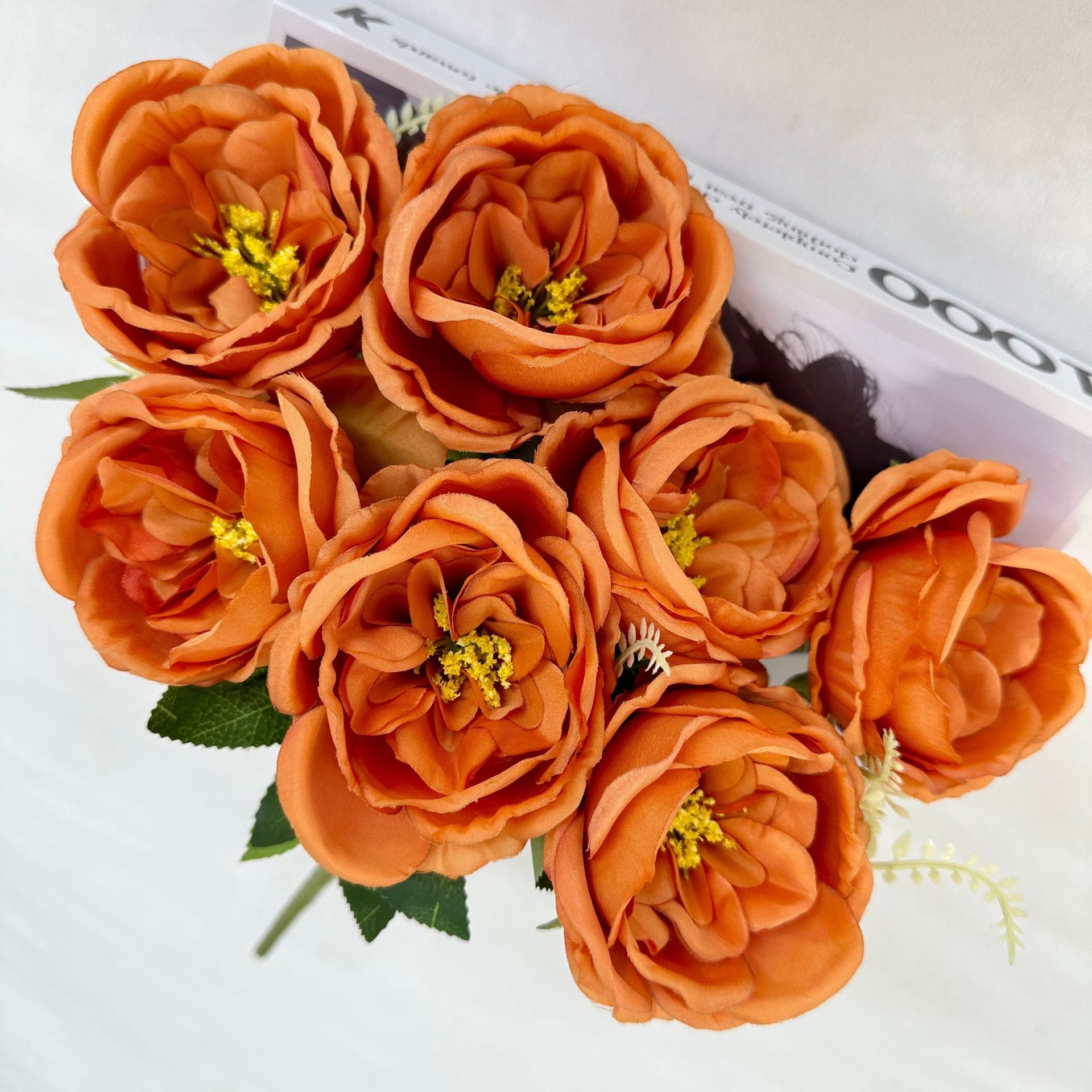 The artificial flowers are Garden Rose made from brushed fabric and are available in 9 colors. Artificial rose flowers are used for home decoration and wedding flower arrangements. Leafhometrade specializes in providing wholesale custom artificial plants.