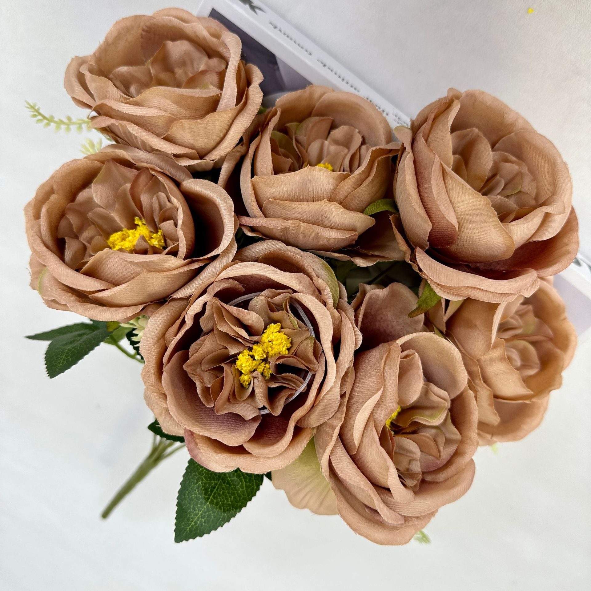 The artificial flowers are Garden Rose made from brushed fabric and are available in 9 colors. Artificial rose flowers are used for home decoration and wedding flower arrangements. Leafhometrade specializes in providing wholesale custom artificial plants.