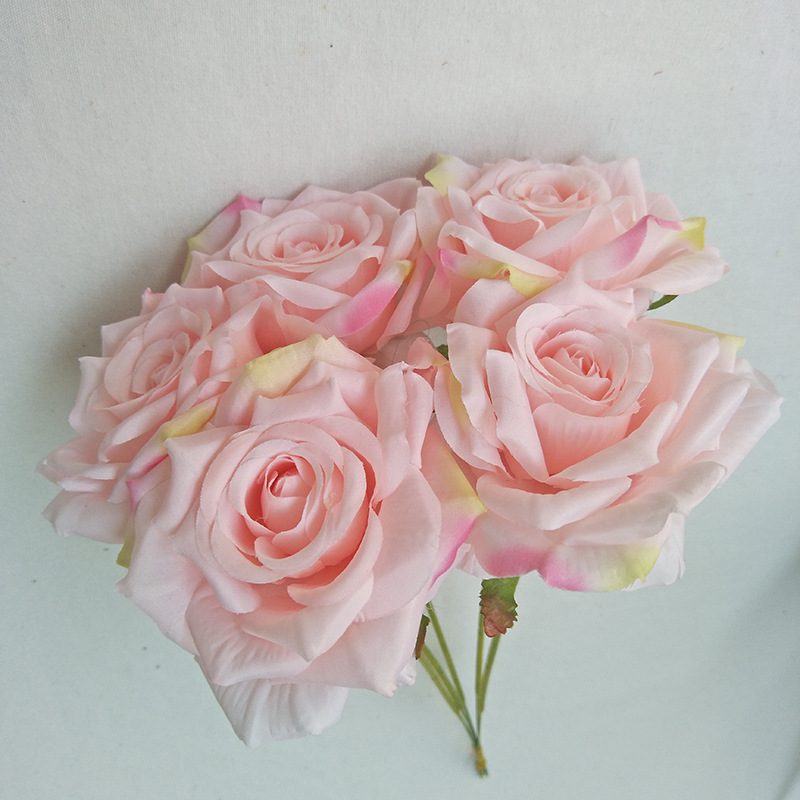 Eternal Rose is a garden rose made of silk cloth and available in 7 colors. Artificial roses are used for wedding decorations and photography props. Leafhometrade specializes in wholesale bespoke artificial plants.