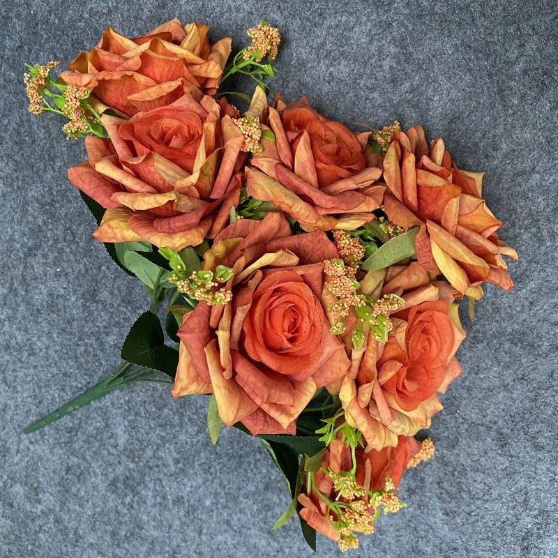 7 heads rose bouquet is a hybrid tea rose, made of laminated pleated cloth and has 19 colors to choose from. Artificial roses are used in interior living room decoration and wedding decoration flowers. Leafhometrade specializes in providing wholesale customized artificial plants.