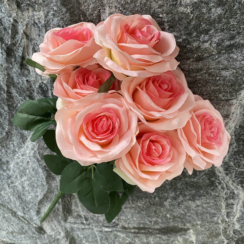 7 heads rose bouquet is a hybrid tea rose, made of silk cloth and has 29 colors to choose from. Artificial roses are used in plant wall and arch decoration. Leafhometrade specializes in providing wholesale customized artificial plants.