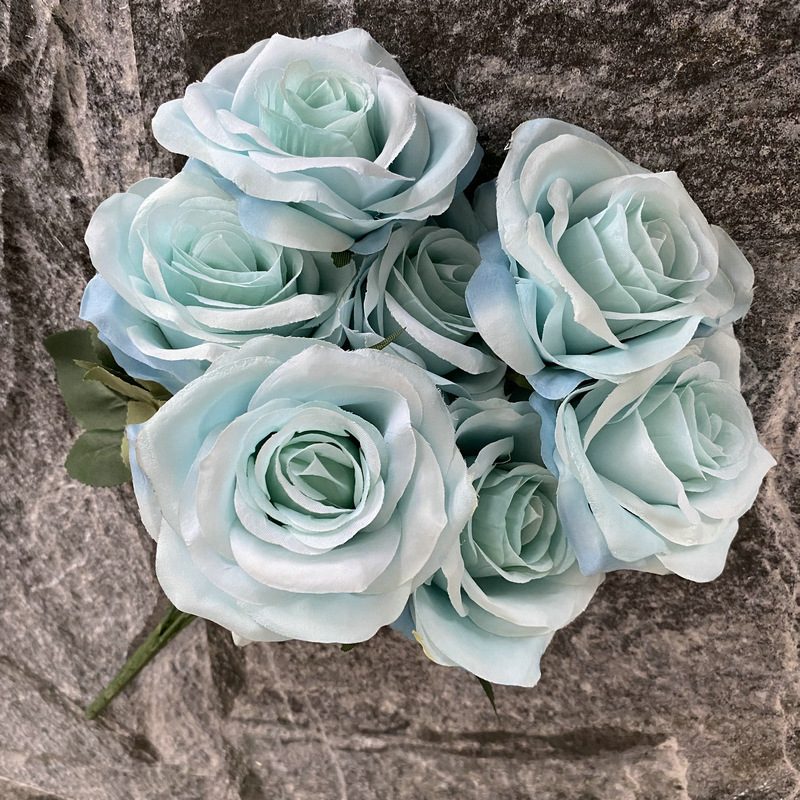 7 heads rose bouquet is a hybrid tea rose, made of silk cloth and has 29 colors to choose from. Artificial roses are used in plant wall and arch decoration. Leafhometrade specializes in providing wholesale customized artificial plants.