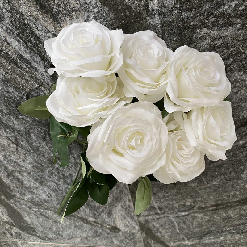 7 heads rose bouquet is a hybrid tea rose, made of silk cloth and has 29 colors to choose from. Artificial roses are used in plant wall and arch decoration. Leafhometrade specializes in providing wholesale customized artificial plants.