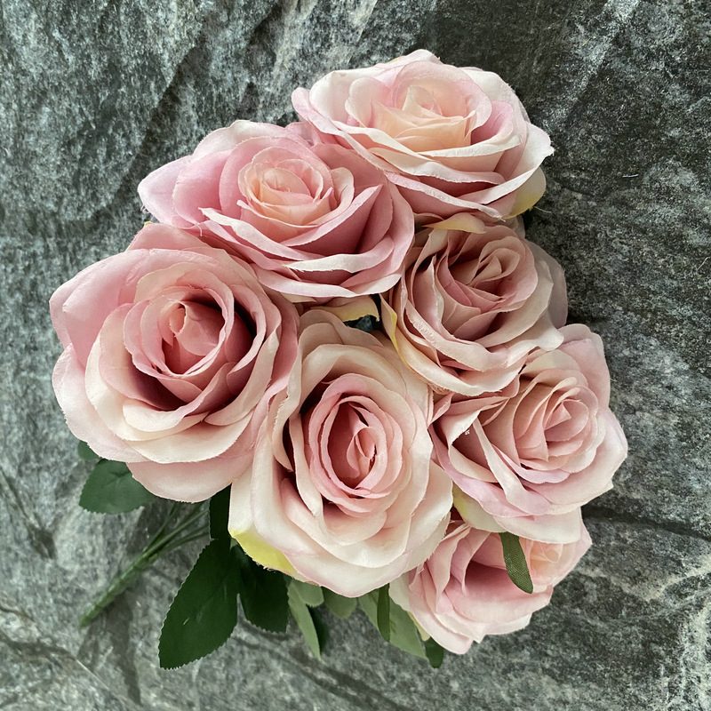 7 heads rose bouquet is a hybrid tea rose, made of silk cloth and has 29 colors to choose from. Artificial roses are used in plant wall and arch decoration. Leafhometrade specializes in providing wholesale customized artificial plants.