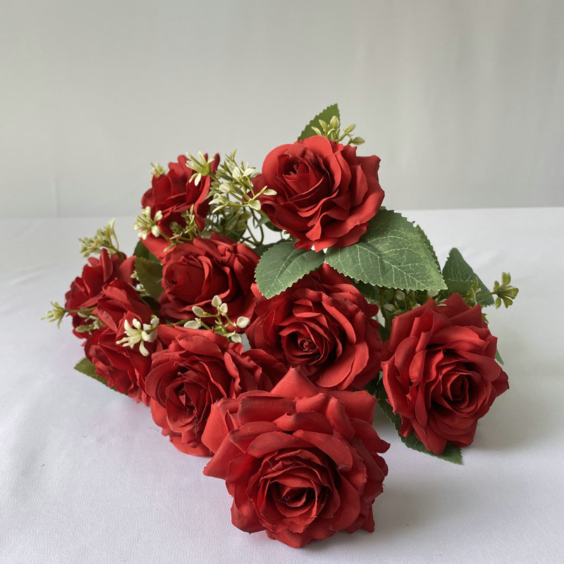 9 heads rose bouquet is a hybrid tea rose, made of Brushed cloth and has 8 colors to choose from. Artificial roses are used in home decoration and wedding decoration flowers. Leafhometrade specializes in providing wholesale customized artificial plants.