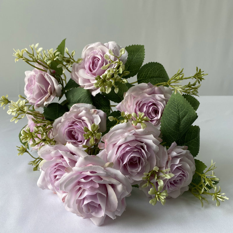 9 heads rose bouquet is a hybrid tea rose, made of Brushed cloth and has 8 colors to choose from. Artificial roses are used in home decoration and wedding decoration flowers. Leafhometrade specializes in providing wholesale customized artificial plants.