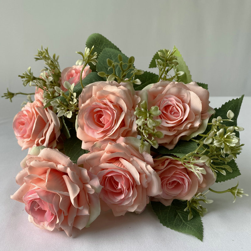 9 heads rose bouquet is a hybrid tea rose, made of Brushed cloth and has 8 colors to choose from. Artificial roses are used in home decoration and wedding decoration flowers. Leafhometrade specializes in providing wholesale customized artificial plants.