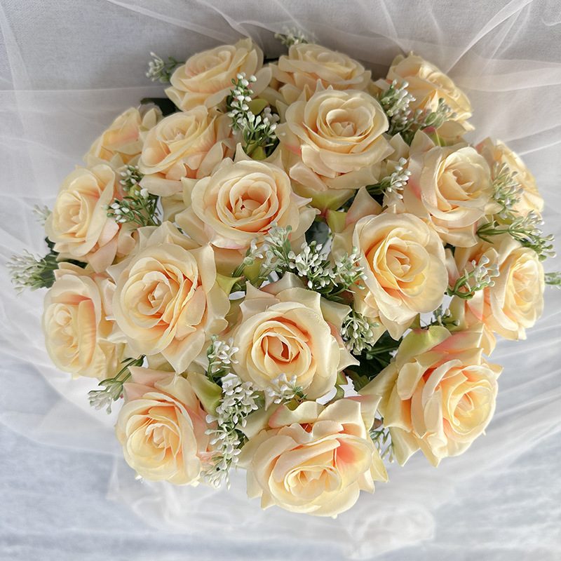 18 heads rose bouquet is a hybrid tea rose, made of silk cloth and has 13 colors to choose from. Artificial roses are used in plant wall and arch decoration. Leafhometrade specializes in providing wholesale customized artificial plants.