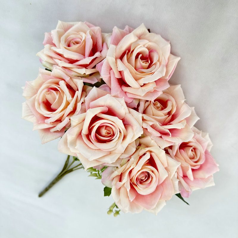 7 heads rose bouquet is a hybrid tea rose, made of velvet cloth and has 17 colors to choose from. Artificial roses are used in home decoration and photography layout props. Leafhometrade specializes in providing wholesale customized artificial plants.