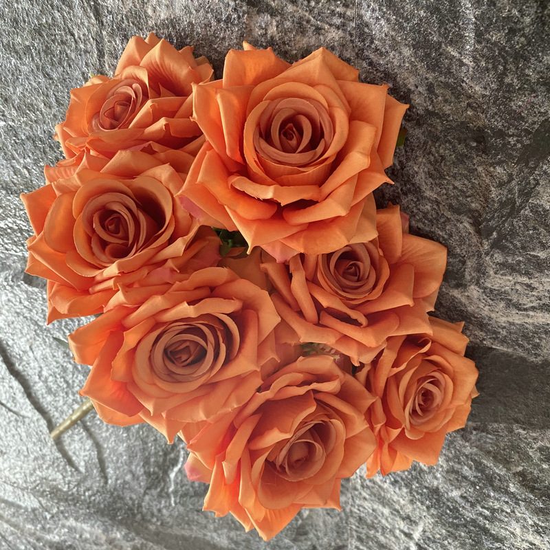 7 heads rose bouquet is a hybrid tea rose, made of velvet cloth and has 17 colors to choose from. Artificial roses are used in home decoration and photography layout props. Leafhometrade specializes in providing wholesale customized artificial plants.