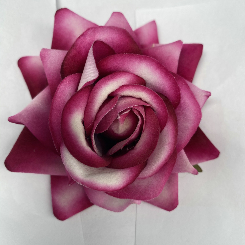 Rose flower head made of Flannel cloth, and has 11 colors to choose from. Fake rose flower head are used in holiday party and Wedding decoration. Leafhometrade specializes in providing wholesale customized artificial plants.