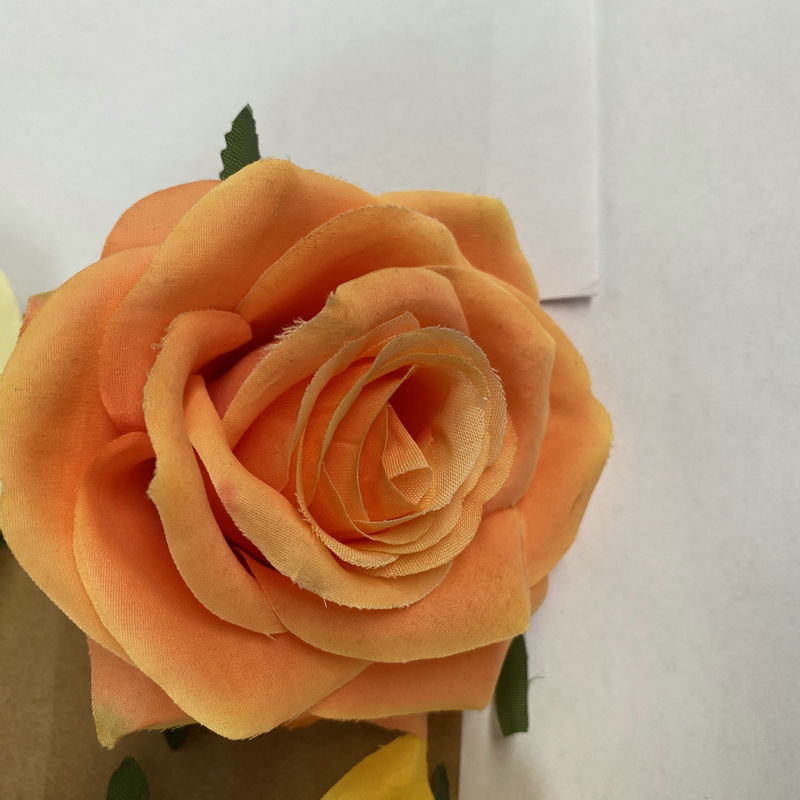 Rose flower head made of brushed cloth, and has 24 colors to choose from. Artificial rose flower head are used in holiday party, home decoration and Wedding Corsage. Leafhometrade specializes in providing wholesale customized artificial plants.