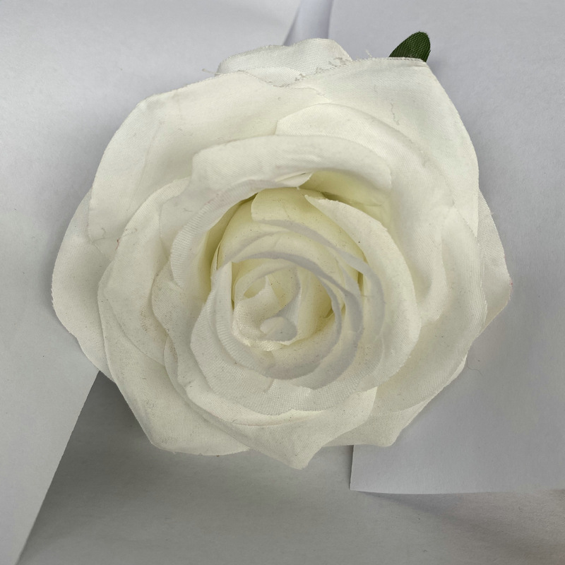 Rose flower head made of brushed cloth, and has 24 colors to choose from. Artificial rose flower head are used in holiday party, home decoration and Wedding Corsage. Leafhometrade specializes in providing wholesale customized artificial plants.