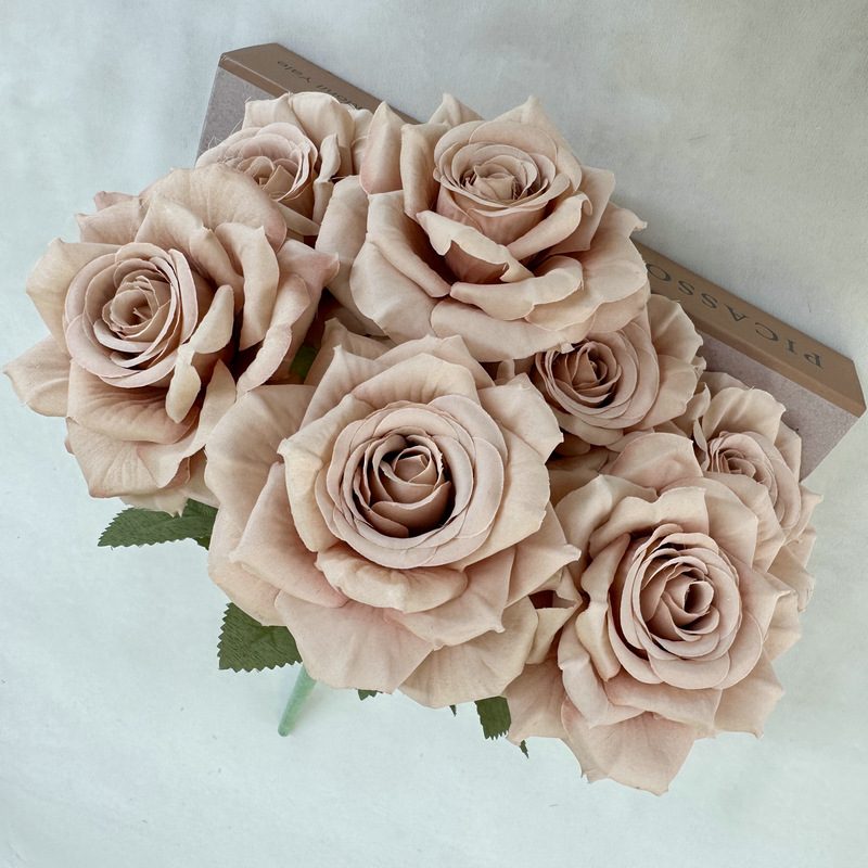 The fake floral are Shrub Rose, made of silk cloth, and available in 9 colors. Artificial rose flowers are used for wedding decoration and party decoration. Leafhometrade specializes in providing wholesale custom artificial flowers.