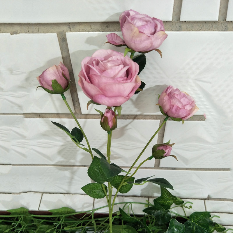 The outdoor artificial flowers are Shrub Rose, made of fabric cloth, and available in 14 colors. Artificial rose flowers are used for wedding reception decorations and party decoration. Leafhometrade specializes in providing wholesale custom artificial flowers.