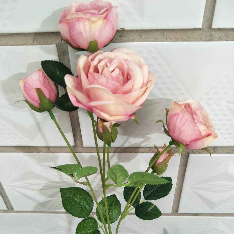 The outdoor artificial flowers are Shrub Rose, made of fabric cloth, and available in 14 colors. Artificial rose flowers are used for wedding reception decorations and party decoration. Leafhometrade specializes in providing wholesale custom artificial flowers.