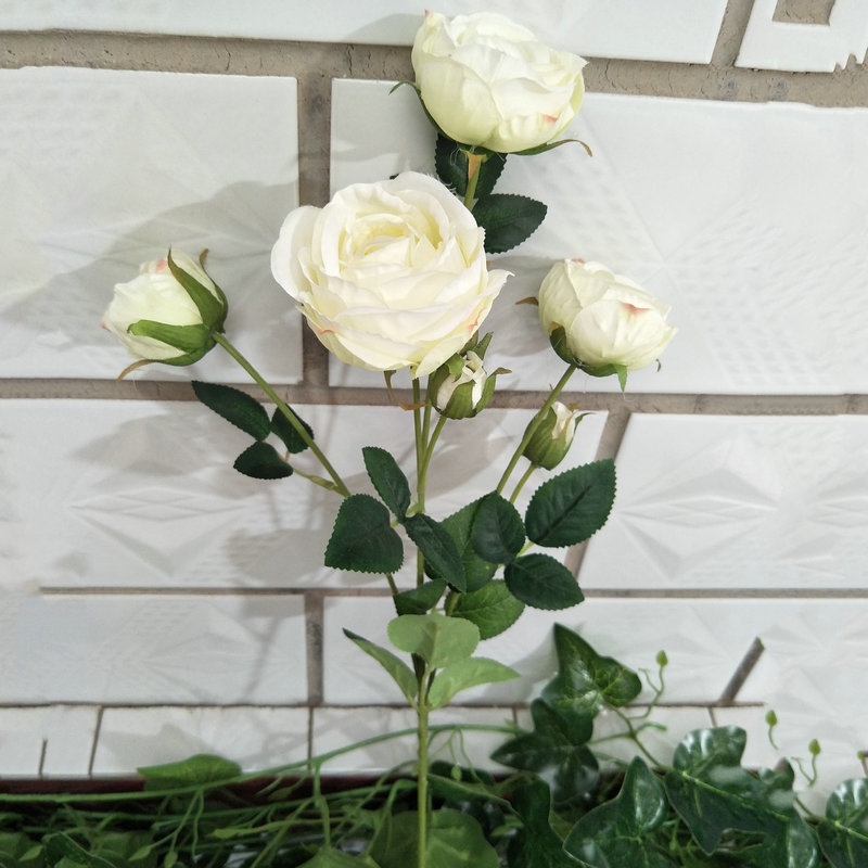 The outdoor artificial flowers are Shrub Rose, made of fabric cloth, and available in 14 colors. Artificial rose flowers are used for wedding reception decorations and party decoration. Leafhometrade specializes in providing wholesale custom artificial flowers.