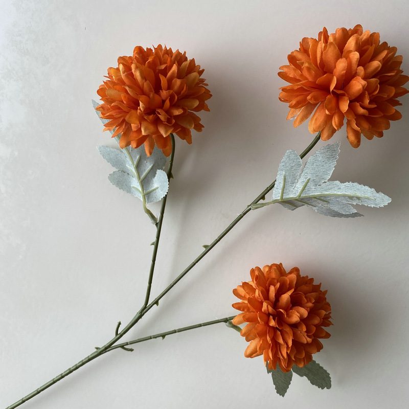 Artificial chrysanthemum are made of silk cloth and is available in 25 colors. Fake chrysanthemum flowers are used for decor Outdoor, front porch, back deck, garden, balcony, terrace, patio, reservation area, hotel and restaurant. Faux chrysanthemum arrangements can be paired with Begonias, ornamental cabbages, dahlias, roses, tulips, lilies, berries., etc. Leafhometrade specializes in providing wholesale custom artificial chrysanthemum stems.