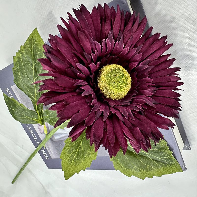 Artificial gerbera are made of 240 fabric cloth and is available in 8 colors. Fake gerbera flowers are used for decor Outdoor, front porch, back deck, garden, balcony, terrace, patio, reservation area, hotel and restaurant. Faux gerbera daisy arrangements can be paired with Begonias, ornamental cabbages, dahlias, roses, tulips, lilies, berries, etc. Leafhometrade specializes in providing wholesale custom artificial gerbera daisy stems.