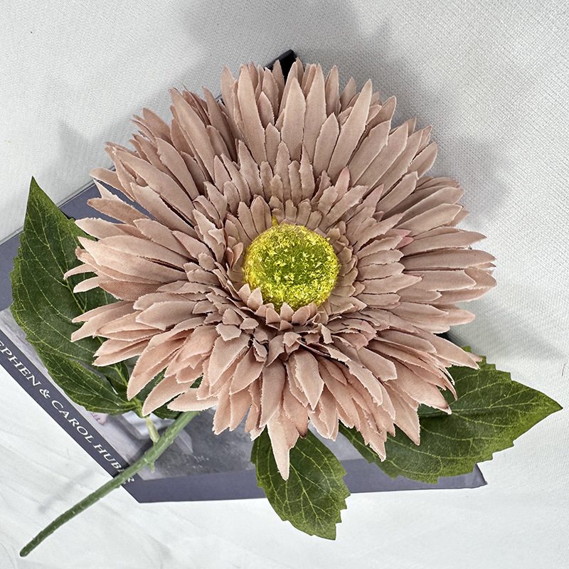 Artificial gerbera are made of 240 fabric cloth and is available in 8 colors. Fake gerbera flowers are used for decor Outdoor, front porch, back deck, garden, balcony, terrace, patio, reservation area, hotel and restaurant. Faux gerbera daisy arrangements can be paired with Begonias, ornamental cabbages, dahlias, roses, tulips, lilies, berries, etc. Leafhometrade specializes in providing wholesale custom artificial gerbera daisy stems.