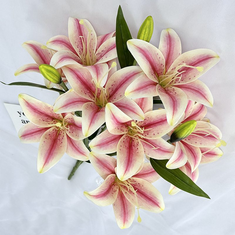 Fake lily flowers are made of 3D printing cloth, available in 10 colors. Lily artificial flowers are used for Car Decor,Exhibition,Home Decor,Hotel Decor,Office Decor. In terms of décor, the Peace Lily can be used as a focal point in a room or as a complement to other decorative elements. Lily flower arrangement can be matched with Delphinium,Viburnum,Hydrangea,Roses,Jasmine,Celosia,Miscanthus,Zinnias,Cosmos,Branches,dahlias,button poms,Ruscus,Chrysanthemums,Grasses and greenery ect. Leafhometrade specializes in providing wholesale custom artificial plants.