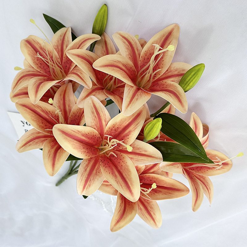 Fake lily flowers are made of 3D printing cloth, available in 10 colors. Lily artificial flowers are used for Car Decor,Exhibition,Home Decor,Hotel Decor,Office Decor. In terms of décor, the Peace Lily can be used as a focal point in a room or as a complement to other decorative elements. Lily flower arrangement can be matched with Delphinium,Viburnum,Hydrangea,Roses,Jasmine,Celosia,Miscanthus,Zinnias,Cosmos,Branches,dahlias,button poms,Ruscus,Chrysanthemums,Grasses and greenery ect. Leafhometrade specializes in providing wholesale custom artificial plants.