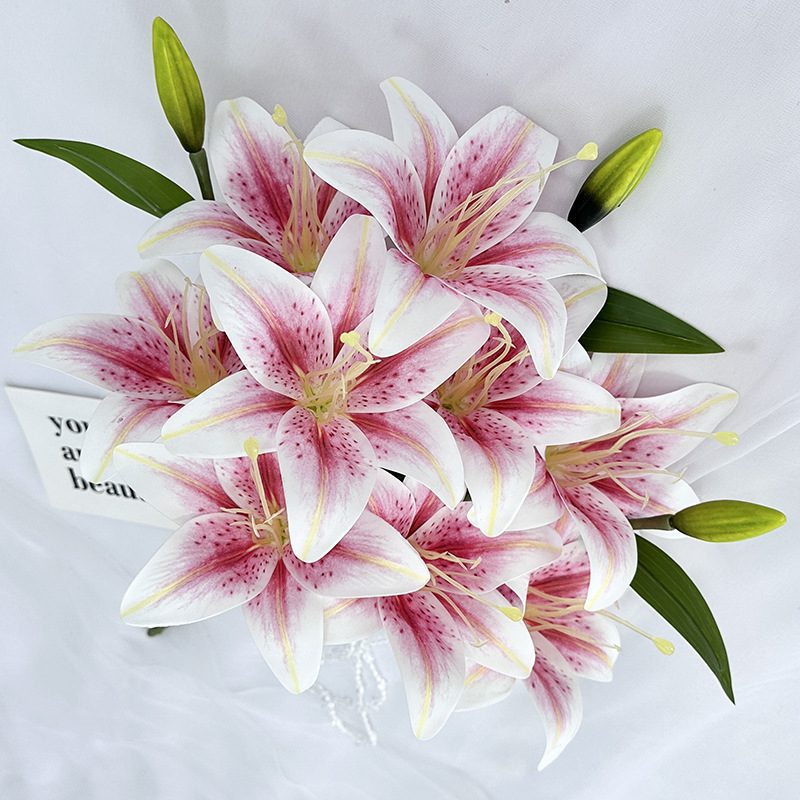 Fake lily flowers are made of 3D printing cloth, available in 10 colors. Lily artificial flowers are used for Car Decor,Exhibition,Home Decor,Hotel Decor,Office Decor. In terms of décor, the Peace Lily can be used as a focal point in a room or as a complement to other decorative elements. Lily flower arrangement can be matched with Delphinium,Viburnum,Hydrangea,Roses,Jasmine,Celosia,Miscanthus,Zinnias,Cosmos,Branches,dahlias,button poms,Ruscus,Chrysanthemums,Grasses and greenery ect. Leafhometrade specializes in providing wholesale custom artificial plants.