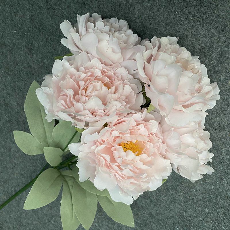 Artificial peony flowers is made of fabric cloth and is available in 6 colors. Peony Flower Arrangement are used for wedding bouquet, party, office decoration, altar, church. Artificial peony flower arrangements can be paired with Tulips, eucalyptus leaves, hydrangeas, dahlias, roses, baby's breath, green greenery stem, etc. Leafhometrade specializes in providing wholesale custom artificial peony flowers.