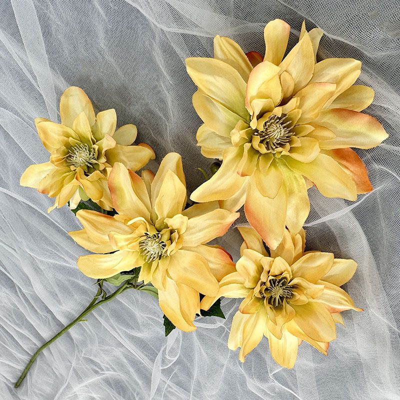 Faux Dahlia Flowers is made of silk cloth and is available in 8 colors. Dahlia Flower Arrangement are used for wedding decorations, hotel lobbies, parties and other ceremonies. Artificial dahlia flower arrangements can be paired with roses, hydrangeas, sunflowers, chrysanthemums, green greenery stem, etc. Leafhometrade specializes in providing wholesale custom artificial plants.