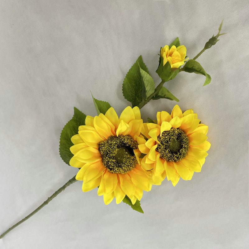 Fake sunflower bouquet are made of silk cloth, available in 9 colors. Artificial sunflower arrangements are particularly suitable for decorating tables, as wall and door decorations or as vase flowers.. Sunflower flower arrangements can be paired with seasonal leaves, roses, eucalyptus leaves, chrysanthemums, sage, daisies, carnations, lilies, delphiniums, gerberas, lilies and daffodils. Leafhometrade specializes in providing wholesale custom artificial plants.