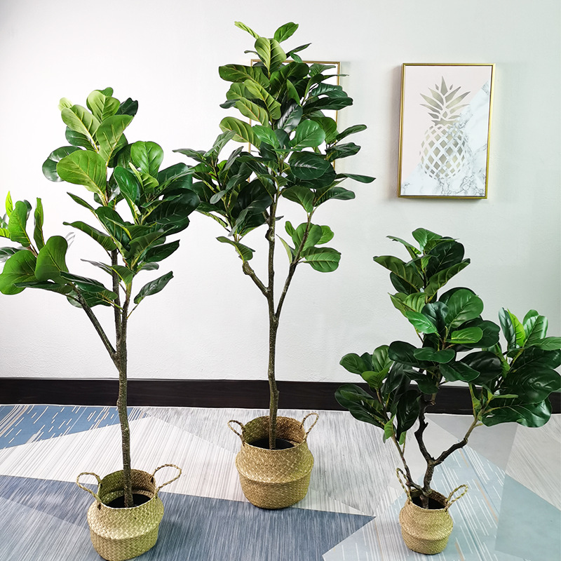 Faux fiddle fig tree are made of Feel glue, environmentally friendly plastic. Artificial trees with extremely realistic appearance can decorate hotels, casinos, restaurants, shopping malls, retail stores, apartment and office buildings, theaters, stadiums and private homes. Artificial trees can be reused for many years, which makes the initial investment a significant saving in the long run, especially when you consider the maintenance costs required for certain types of trees. Once installed, artificial trees require no maintenance, watering and cleaning, except for occasional dusting when the situation requires it. Leafhometrade specializes in providing wholesale custom artificial plants.