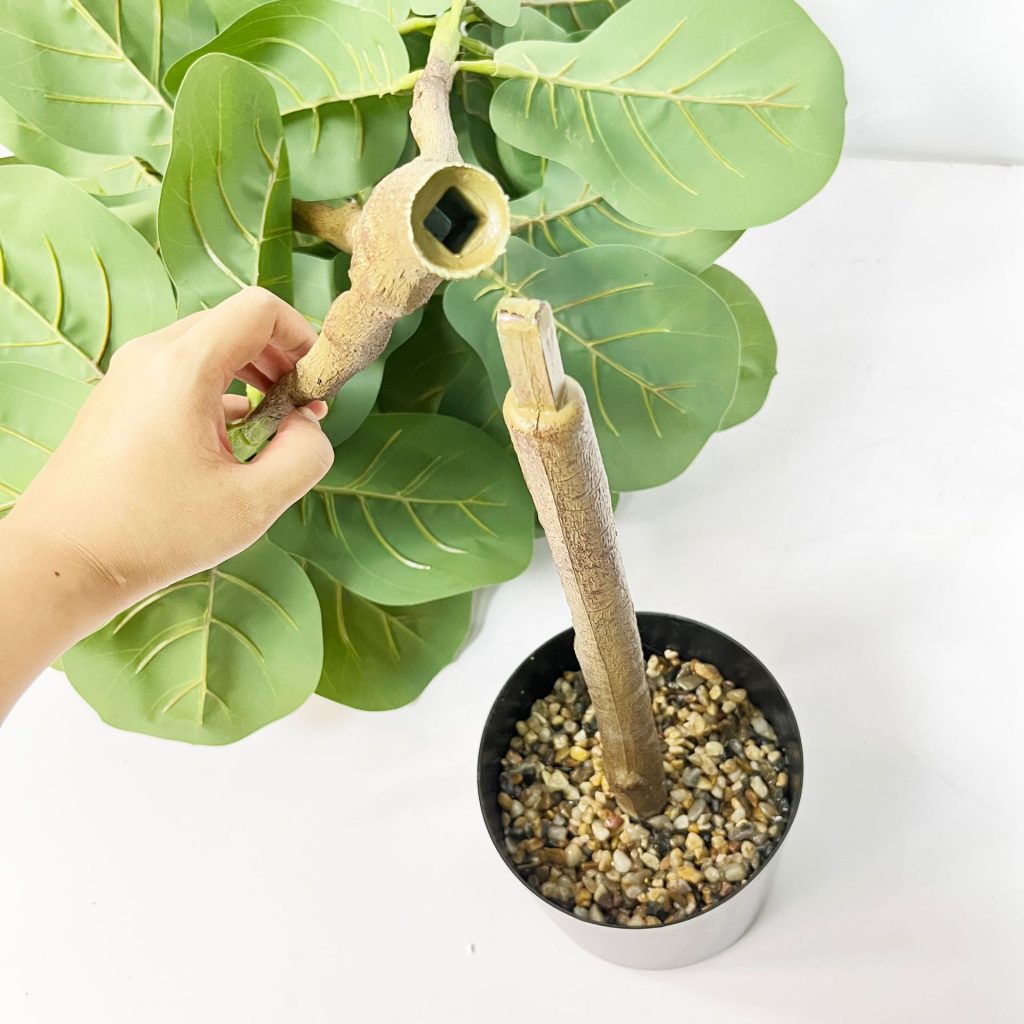 Faux fiddle fig tree are made of Feel glue, environmentally friendly plastic. Artificial trees with extremely realistic appearance can decorate hotels, casinos, restaurants, shopping malls, retail stores, apartment and office buildings, theaters, stadiums and private homes. Artificial trees can be reused for many years, which makes the initial investment a significant saving in the long run, especially when you consider the maintenance costs required for certain types of trees. Once installed, artificial trees require no maintenance, watering and cleaning, except for occasional dusting when the situation requires it. Leafhometrade specializes in providing wholesale custom artificial plants.