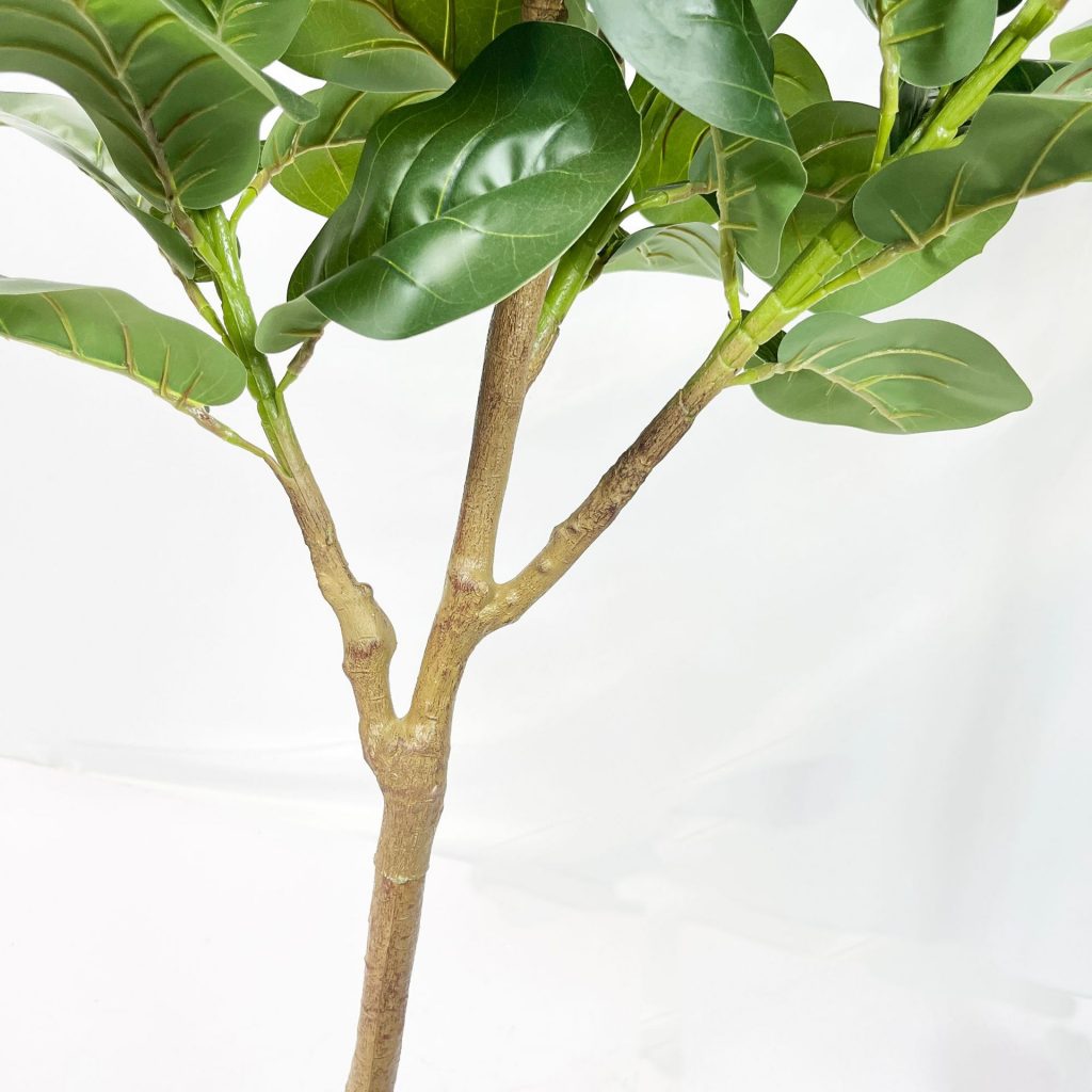 Faux fiddle fig tree are made of Feel glue, environmentally friendly plastic. Artificial trees with extremely realistic appearance can decorate hotels, casinos, restaurants, shopping malls, retail stores, apartment and office buildings, theaters, stadiums and private homes. Artificial trees can be reused for many years, which makes the initial investment a significant saving in the long run, especially when you consider the maintenance costs required for certain types of trees. Once installed, artificial trees require no maintenance, watering and cleaning, except for occasional dusting when the situation requires it. Leafhometrade specializes in providing wholesale custom artificial plants.