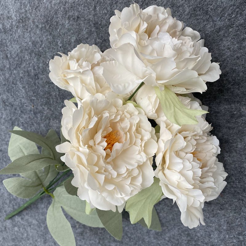 Faux Peonies is made of fabric cloth and is available in 11 colors. Peony faux flowers are used for wedding bouquet, party, office decoration, altar, church. Artificial peony flower arrangements can be paired with Tulips, eucalyptus leaves, hydrangeas, dahlias, roses, baby's breath, green greenery stem, etc. Leafhometrade specializes in providing wholesale custom artificial peony flowers.