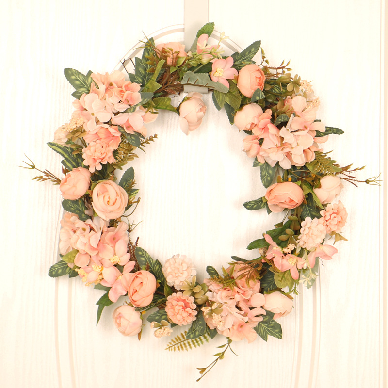 Flower Wreath are made of plastic, cloth, and rattan. Wreath have experienced a significant surge in popularity as versatile home decor items. No longer confined to seasonal displays or special occasions, wreaths are now commonly used year-round to enhance interior and exterior spaces. From vibrant floral wreaths adorning front doors to minimalist greenery wreaths adorning walls, their versatility and customizable nature have captured the attention of interior designers and homeowners alike. The rise of do-it-yourself crafting and online marketplaces has also contributed to the accessibility of wreath-making materials and designs, allowing individuals to express their creativity and personalize their living spaces with these charming and visually appealing accents. Leafhometrade specializes in providing wholesale custom artificial plants.