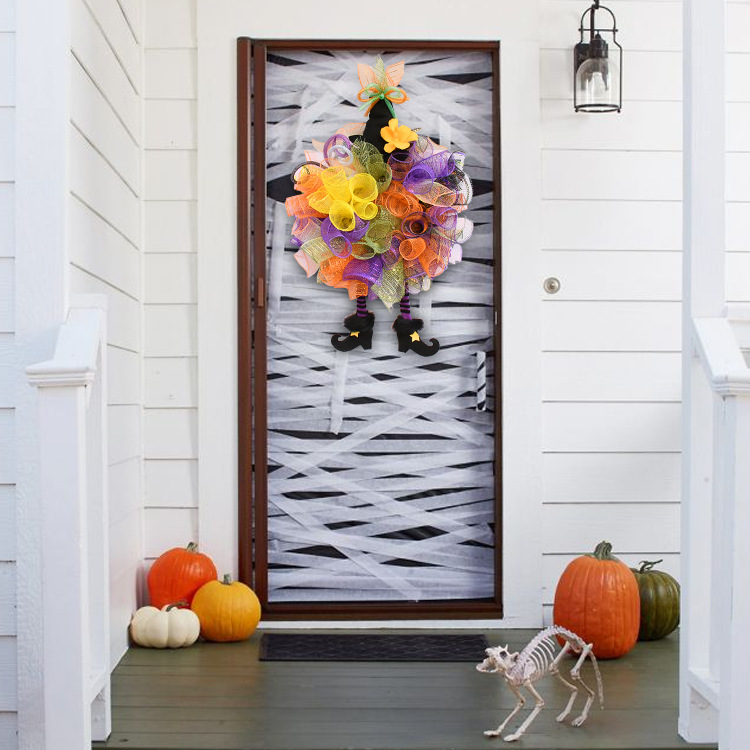 Halloween Wreath are made of PVC, Streamer, clothes. Wreaths are used typically as household ornaments, most commonly as an Advent and Christmas decoration. The decorative elements of Halloween wreaths are as follows: skeleton, Witch Legs, ghosts, pumpkins, LED lights, witch hats, eyeballs, roses, ribbons, streamers,  spiders, spider webs, dead trees, decorative balls, bows, witch, silhouettes, candles, brooms, bones, snakes, pentagrams, Halloween tree garlands, crow, bat, black cat, maple leaf, jack-o'-lanterns, monster, mummy, gargoyles, demons, candy, etc. Leafhometrade specializes in providing wholesale customized halloween decorations.