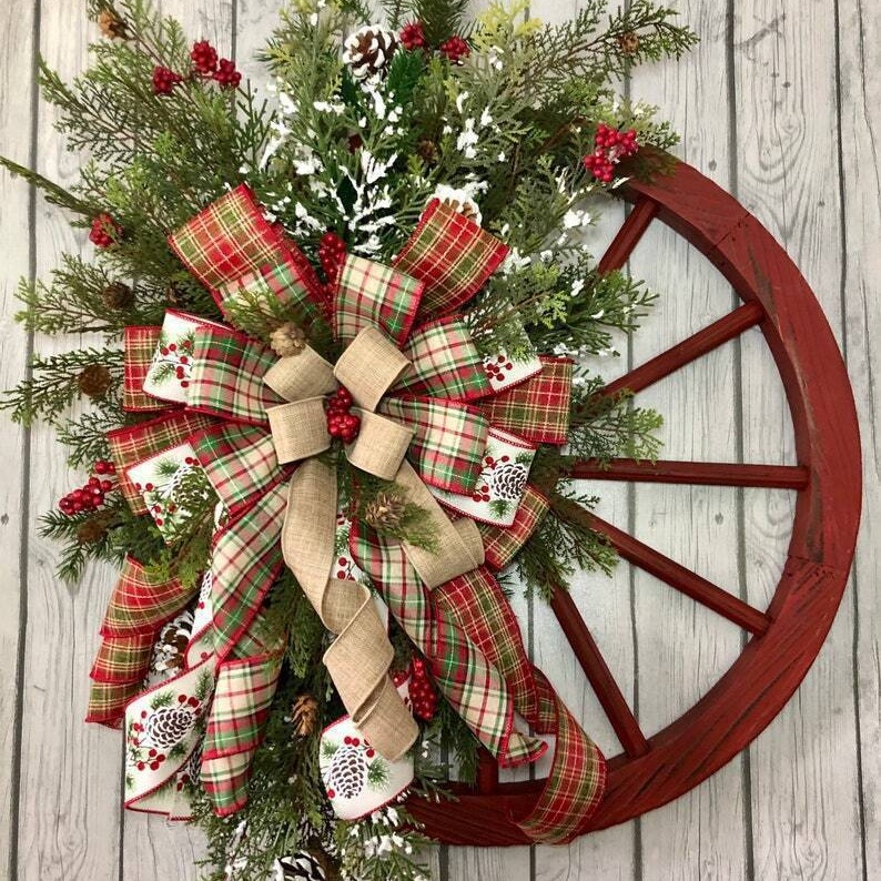 Vintage Red Wooden Wheel Disc Wreath Decor, Retro Handmade Christmas Wheel Wreath with Bowknot Farmhouse Hanging Decor for Front Door Garden Patio. Christmas is December 36th. This day is very important to Christians, celebrating the birth of Jesus Christ, the Son of God. Christmas is also a holiday for many non-Christian cultures around the world. Many people are busy preparing for Christmas celebrations, decorating their homes inside and outside. Essential Christmas Items：Wreaths, Stockings, Christmas tree, Christmas Lights, Candles, Ornaments, Garland, Mistletoe, Nativity Scene, Poinsettia, Tinsel, Angels, Bells, Christmas Village, Lawn Decoration, Reindeer, Tree, Tree Topper, Candy Canes, Christmas cards display, Cosy blankets and throws, Gift wrapping, Glowing lanterns, Christmas Villages, Pillows, Doormats, Christmas Tableware, Santa Claus, carriage toys, Tabletop Trees, Sleighs, Inflatable Snowman, stars, snow globes and angels etc. Leafhometrade specializes in providing wholesale custom Christmas decorations.