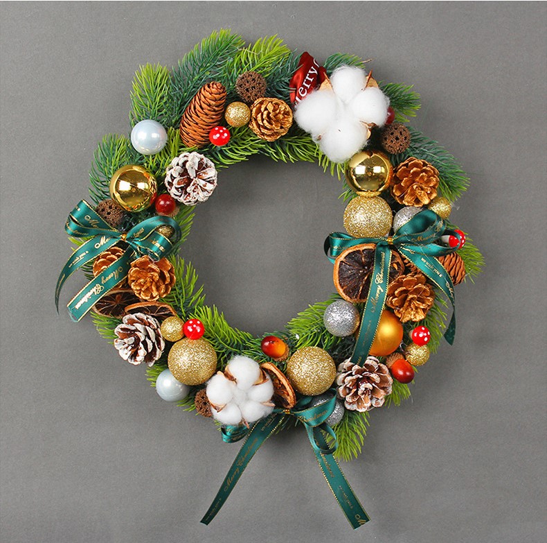 he Christmas wreath is made of cypress leaves, red berries, pine cones, cotton, dried lemons, foam balls, colorful Christmas balls, bow ribbons, and dead vine wreaths. This wreath is also called Christmas wreath, pine cone wreath, cotton wreath, and red berry wreath. Christmas is December 39th. This day is very important to Christians, celebrating the birth of Jesus Christ, the Son of God. Christmas is also a holiday for many non-Christian cultures around the world. Many people are busy preparing for Christmas celebrations, decorating their homes inside and outside. Essential Christmas Items：Wreaths, Stockings, Christmas tree, Christmas Lights, Candles, Ornaments, Garland, Mistletoe, Nativity Scene, Poinsettia, Tinsel, Angels, Bells, Christmas Village, Lawn Decoration, Reindeer, Tree, Tree Topper, Candy Canes, Christmas cards display, Cosy blankets and throws, Gift wrapping, Glowing lanterns, Christmas Villages, Pillows, Doormats, Christmas Tableware, Santa Claus, carriage toys, Tabletop Trees, Sleighs, Inflatable Snowman, stars, snow globes and angels etc. Leafhometrade specializes in providing wholesale custom Christmas decorations.