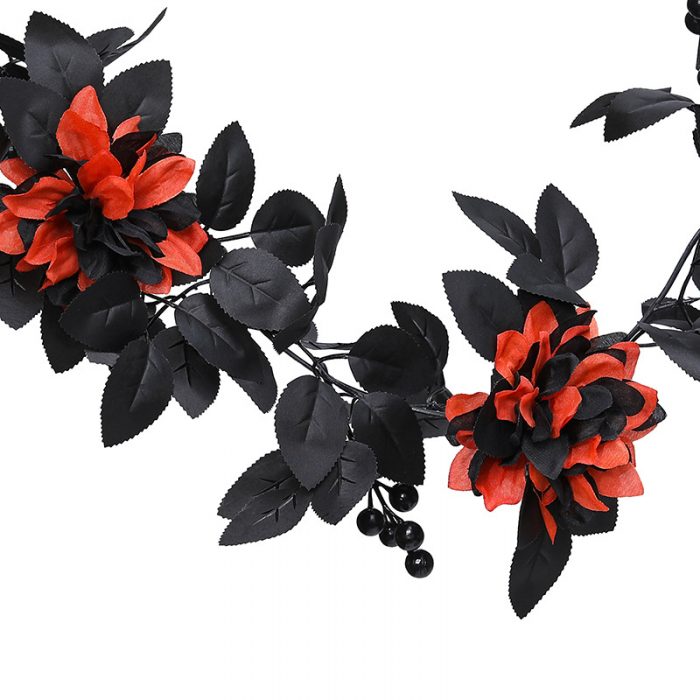 The artificial black rose garland is composed of black rose heads, black rose leaves, golden water plants, and red berries.