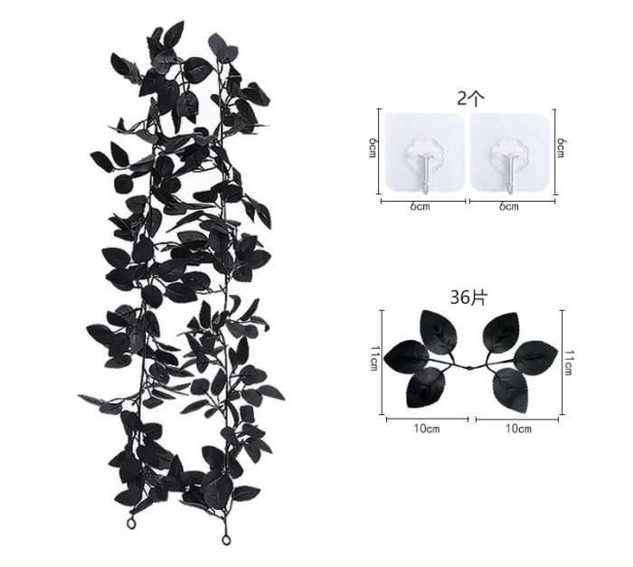 The artificial black rose garland is composed of black rose heads, black rose leaves, golden water plants, and red berries.