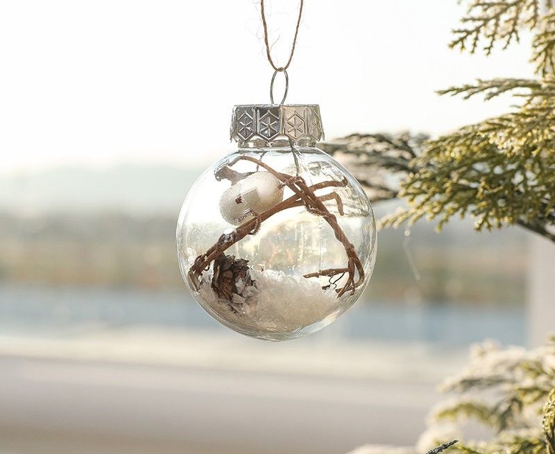 Christmas balls are assembled from round transparent balls and molding lines. The Christmas ball design is very creative.