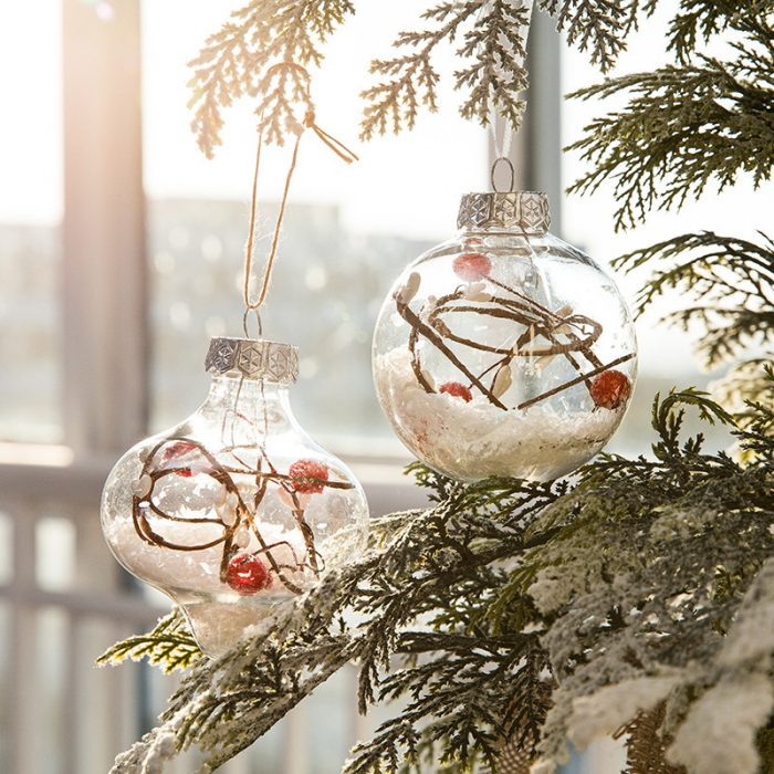 Christmas balls are assembled from round transparent balls and molding lines. The Christmas ball design is very creative.