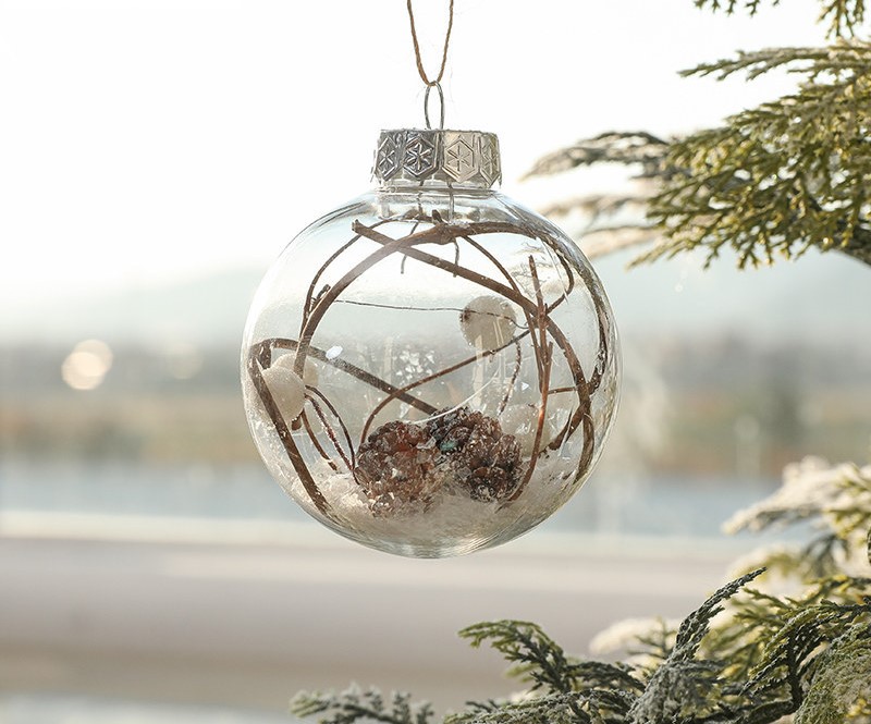 Christmas balls are assembled from round transparent balls and molding lines. The Christmas ball design is very creative.